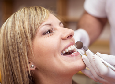 Patient Having Teeth Examined in Honolulu